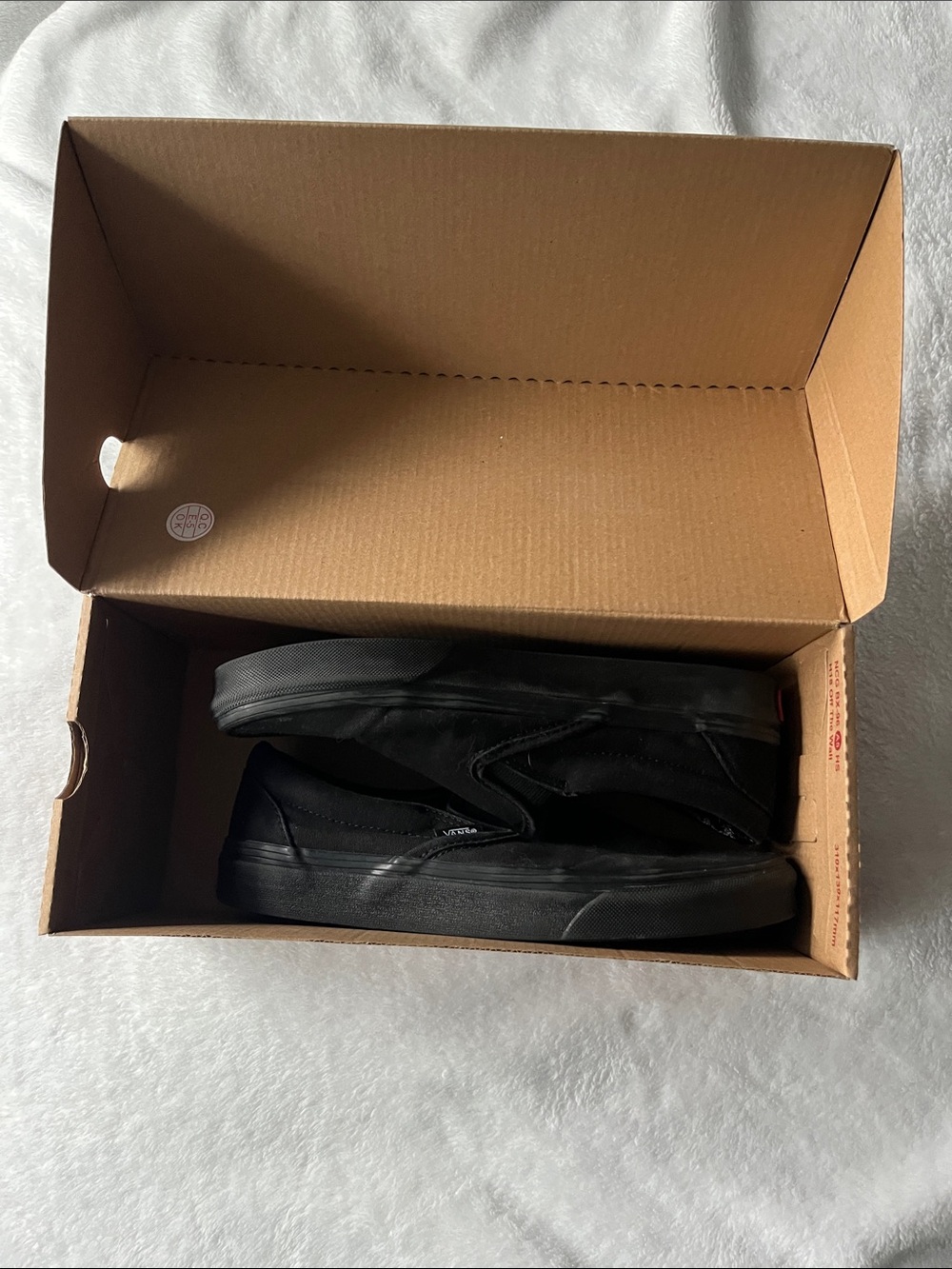 Vans Classic Slip-On Sneakers in Black
